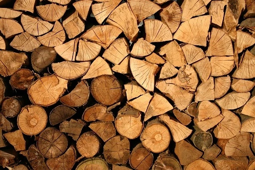 Kiln dried hardwood logs in a stack